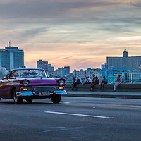 Buy canvas prints of Tourists in a vintage car on the Malecon by Jason Wells