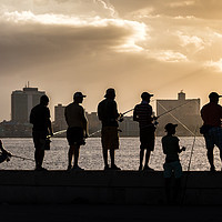 Buy canvas prints of Fishing off the Malecon at sunset by Jason Wells