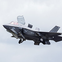 Buy canvas prints of F-35B stealth fighter taking off by Jason Wells