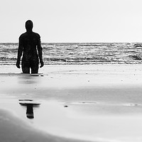 Buy canvas prints of Iron Man looking out to sea by Jason Wells