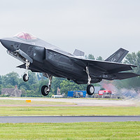 Buy canvas prints of F-35A stealth fighter taking off by Jason Wells