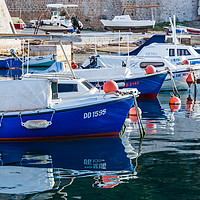 Buy canvas prints of Boats lined up in Dubrovnik harbour by Jason Wells