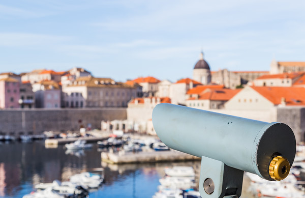 Binoculars overlooking Dubrovnik harbour Picture Board by Jason Wells