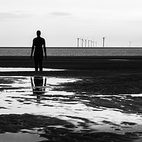 Buy canvas prints of Iron Man looking out at a wind farm by Jason Wells