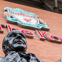 Buy canvas prints of Bill Shankly statue under The Kop sign by Jason Wells