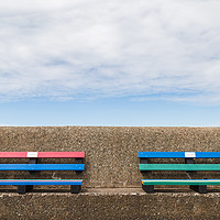 Buy canvas prints of Pair of colourful benches on Wallasey promenade by Jason Wells