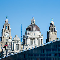 Buy canvas prints of Three Graces above a modern building by Jason Wells