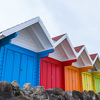 Buy canvas prints of Vibrant beach huts in Scarborough by Jason Wells