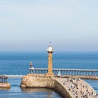 Buy canvas prints of Tourists on the West pier of Whitby harbour by Jason Wells