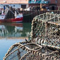 Buy canvas prints of Crab pots in the quayside in Scarborough by Jason Wells