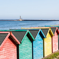 Buy canvas prints of Fading beach huts at Whitby by Jason Wells