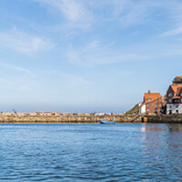 Buy canvas prints of Whitby harbour entrance and East cliff by Jason Wells