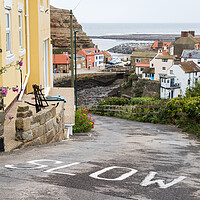 Buy canvas prints of Steep road leading into Staithes by Jason Wells
