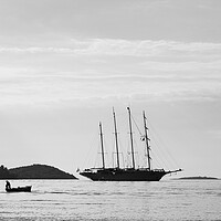 Buy canvas prints of Silhouette of contrasting boats on the Peljesac Ch by Jason Wells