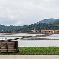 Buy canvas prints of Wooden rail cart in Ston Salt pans by Jason Wells