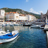 Buy canvas prints of Boats in Hvar Town harbour by Jason Wells