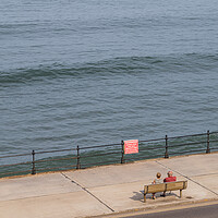 Buy canvas prints of Looking down on a couple on the Scarborough promenade by Jason Wells