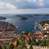 Buy canvas prints of Fortified wall from Hvar castle heading down to th by Jason Wells