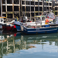 Buy canvas prints of Cluster of fishing boats in Scarborough harbour by Jason Wells