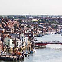 Buy canvas prints of Looking back into Whitby marina by Jason Wells