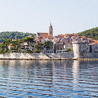 Buy canvas prints of Korcula Old Town jutting out into the sea by Jason Wells