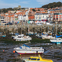 Buy canvas prints of Colourful boats in Scarborough harbour by Jason Wells