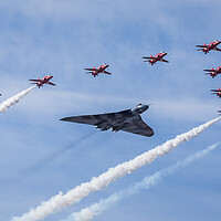 Buy canvas prints of Vulcan and Red Arrows flypast by Jason Wells
