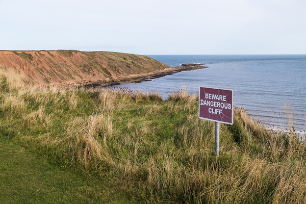 Filey Brigg warning sign Picture Board by Jason Wells