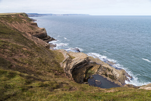 Large pool of water in Filey Brigg Picture Board by Jason Wells
