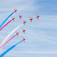 Buy canvas prints of The Red Arrows in tight formation by Jason Wells