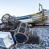 Buy canvas prints of Fishing boat with its crab and lobser pots on the shore by Jason Wells