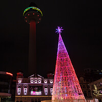 Buy canvas prints of Christmas tree in front of the Playhouse theatre by Jason Wells