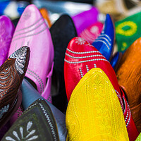 Buy canvas prints of Leather slippers in a souk by Jason Wells