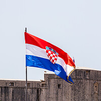 Buy canvas prints of Croatian flag in front of the city walls by Jason Wells