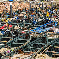 Buy canvas prints of Wooden fishing boats lined up in Agadir harbour by Jason Wells