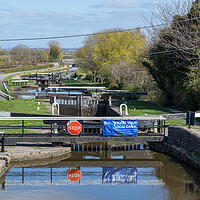 Buy canvas prints of Locks reflecting in the water of Leeds Liverpool canal by Jason Wells