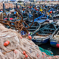 Buy canvas prints of Anchors and nets in front of Agadir harbour by Jason Wells