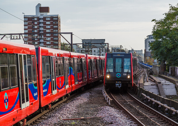 Trains passing on the DLR Picture Board by Jason Wells