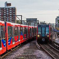 Buy canvas prints of Trains passing on the DLR by Jason Wells