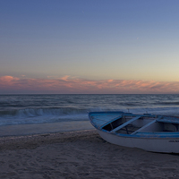 Buy canvas prints of  Fishing Boat at Rincon de la Victoria beach by Ian MacQueen