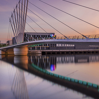 Buy canvas prints of  Sunset over the bridge by Paul Feeley