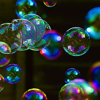 Buy canvas prints of Blowing Bubbles Floating in the Air by Teresa Cooper