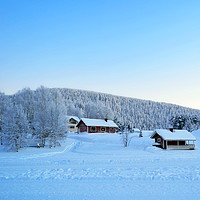 Buy canvas prints of Beautiful Lake Cabins in Winter  by Teresa Cooper