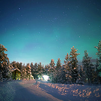 Buy canvas prints of A wooden cabin under the Aurora Borealis  by Teresa Cooper