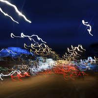 Buy canvas prints of Cars driving motion night lights by Arletta Cwalina