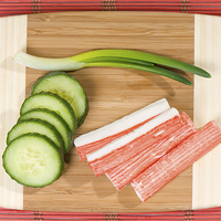 Buy canvas prints of Crab sticks of surimi and cucumber with chives  by Arletta Cwalina