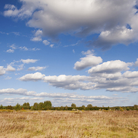Buy canvas prints of Blue sky cloudscape rural landscape  by Arletta Cwalina