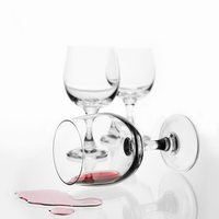 Buy canvas prints of overturned wine glass with red wine splashed out  by Arletta Cwalina
