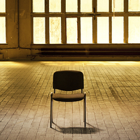 Buy canvas prints of Lone chair empty hall by Arletta Cwalina
