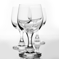 Buy canvas prints of Three empty wine glasses on white  by Arletta Cwalina